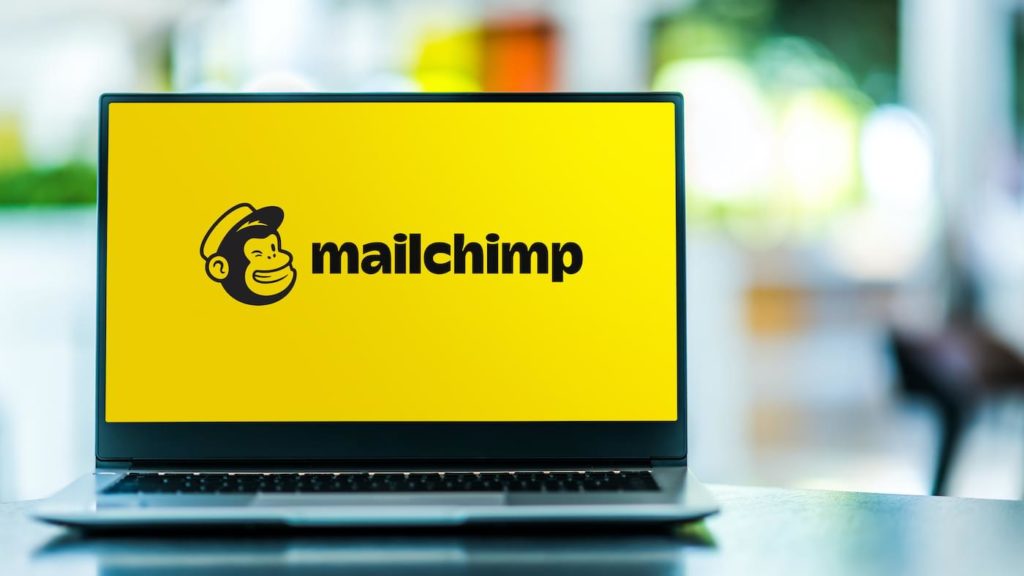 Laptop screen displaying logo of Mailchimp